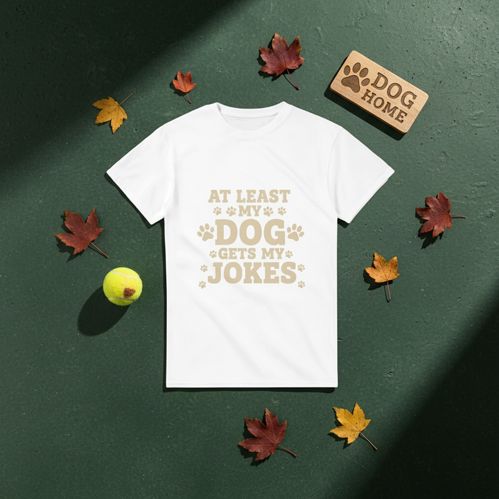 White - At Least My Dog Gets My Jokes tee, flat lay