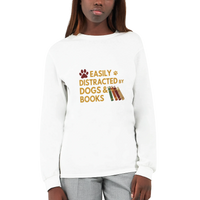 Load image into Gallery viewer, White - Easily Distracted by Dogs and Books long sleeve tee, worn by a woman, plain light background
