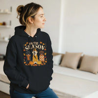 Load image into Gallery viewer, Black - Tis the Season Fall Labs hoodie, worn by a woman in a bright living room
