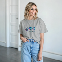 Load image into Gallery viewer, Ash - Peace Love Dogs tee, worn by woman, white paneled room
