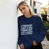 Load image into Gallery viewer, Navy - I Thought I Got a Dog sweatshirt, worn by a woman leaning on a white wall
