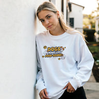 Load image into Gallery viewer, White - Dogs Make Life Paw-some sweatshirt, worn by a woman leaning on a white wall
