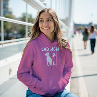 Load image into Gallery viewer, Azalea - Lab Mom hoodie, worn by woman on urban walkway
