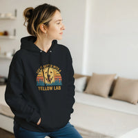 Load image into Gallery viewer, Black - Life Is Better With a Yellow Lab hoodie, worn by a woman in a bright living room
