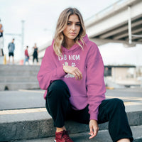 Load image into Gallery viewer, Azalea - Lab Mom hoodie, worn by woman sitting on city steps
