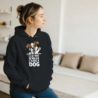 Load image into Gallery viewer, Black - I Am Not Single I Have A Dog hoodie, worn by a woman sitting on a couch in a living room
