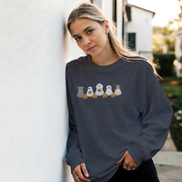 Load image into Gallery viewer, Dark Heather - Dog Ghost Halloween sweatshirt, worn by a woman leaning on a white wall

