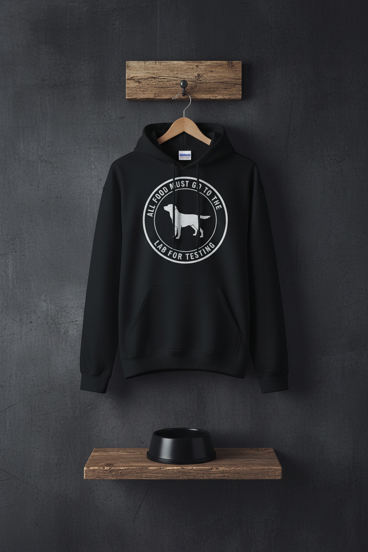 Black - All Food Must Go To The Lab For Testing hoodie, on a hanger