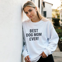 Load image into Gallery viewer, White - Best Dog Mom Ever sweatshirt, worn by a woman leaning on a white wall
