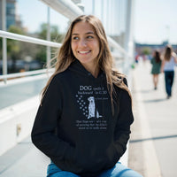 Load image into Gallery viewer, Black - Dog Spelled Backwards Is God hoodie, worn by a smiling woman on a sunny walkway
