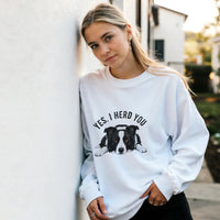 Load image into Gallery viewer, White - Yes I Herd You Border Collie sweatshirt, worn by a woman leaning on a white wall
