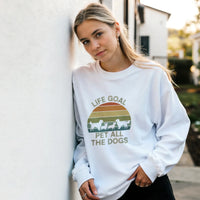 Load image into Gallery viewer, White - Life Goal Pet All The Dogs sweatshirt, worn by a woman leaning on a white wall
